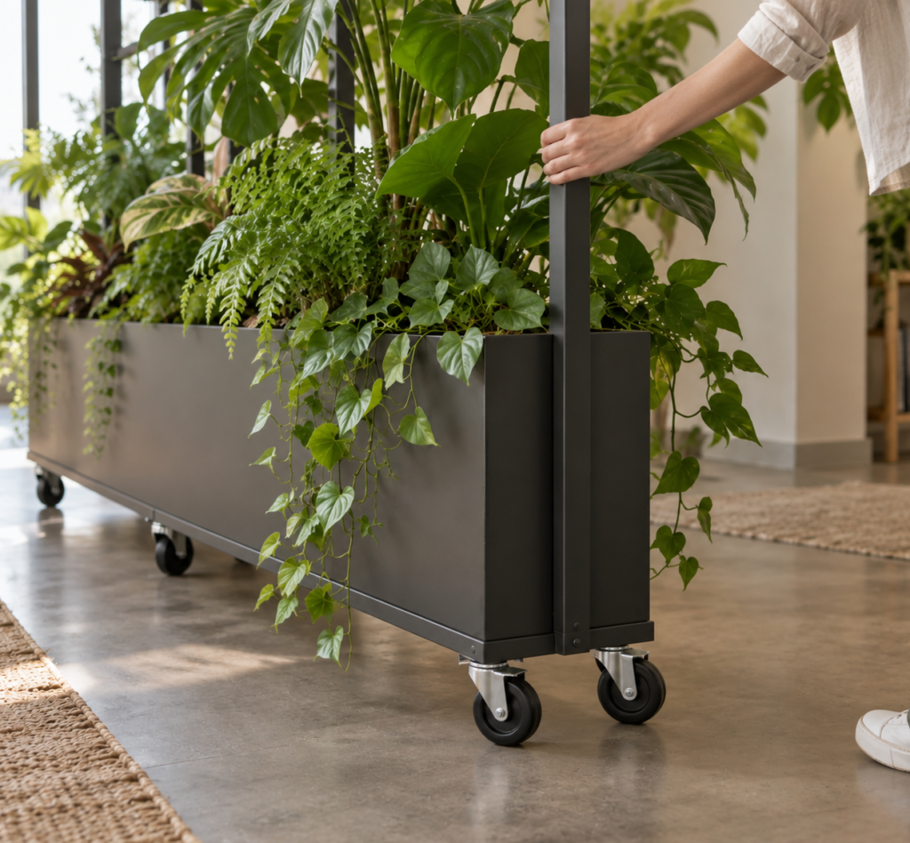 Rolling plant divider being moved to open a passage between two areas
